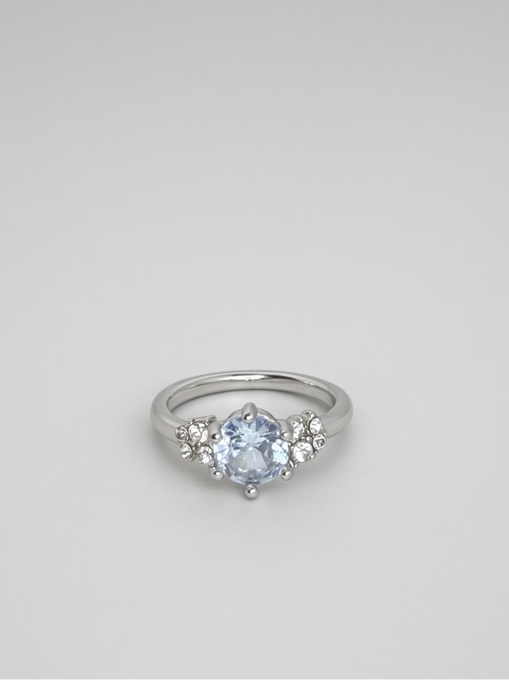 Size 6.5 Silver Ring with Light Blue Center Stone and Crystal Accents Unsigned